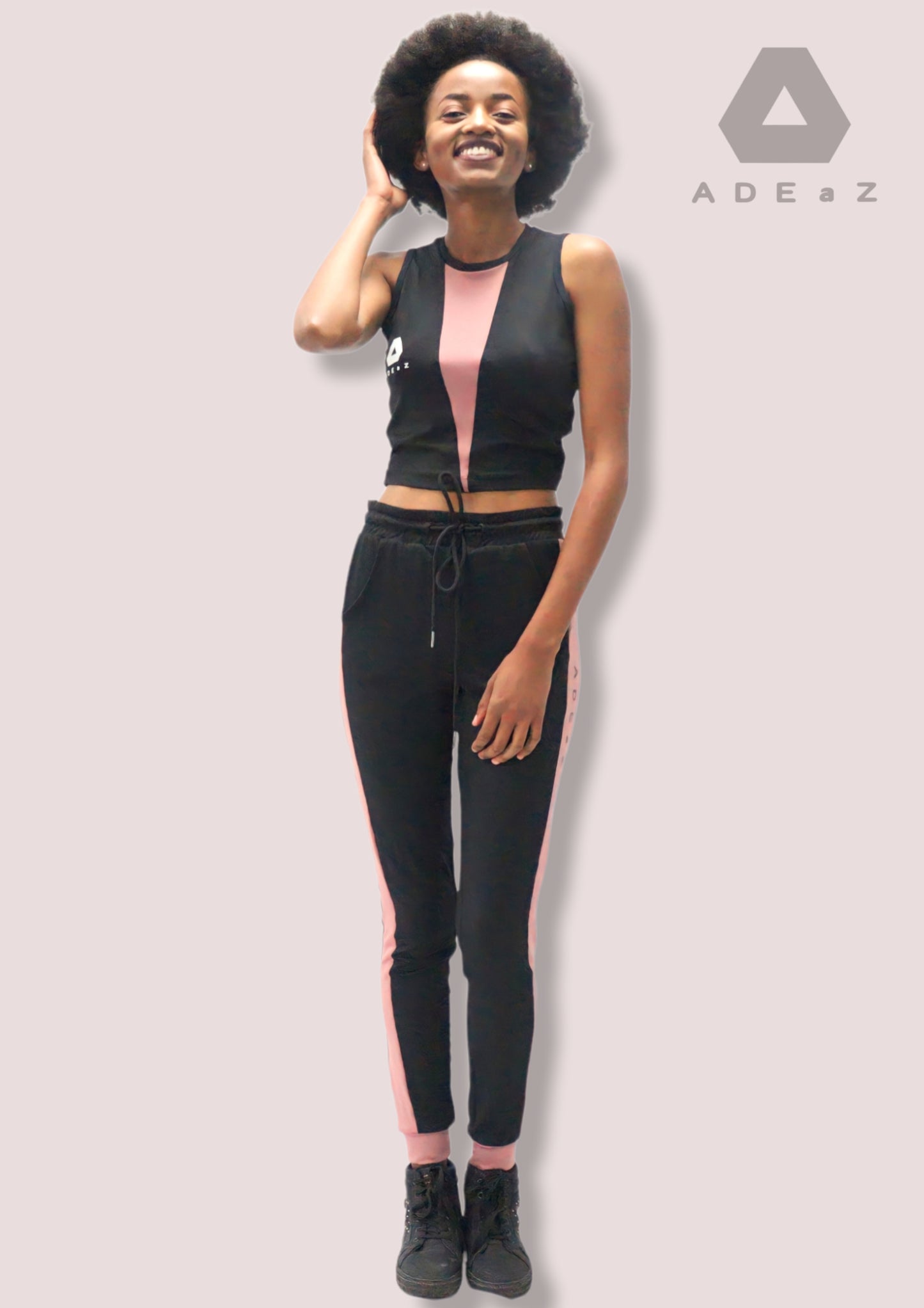 Poly spandex sweatpants featuring jewel-striped accents, blending comfort with a touch of elegant and vibrant detailing.