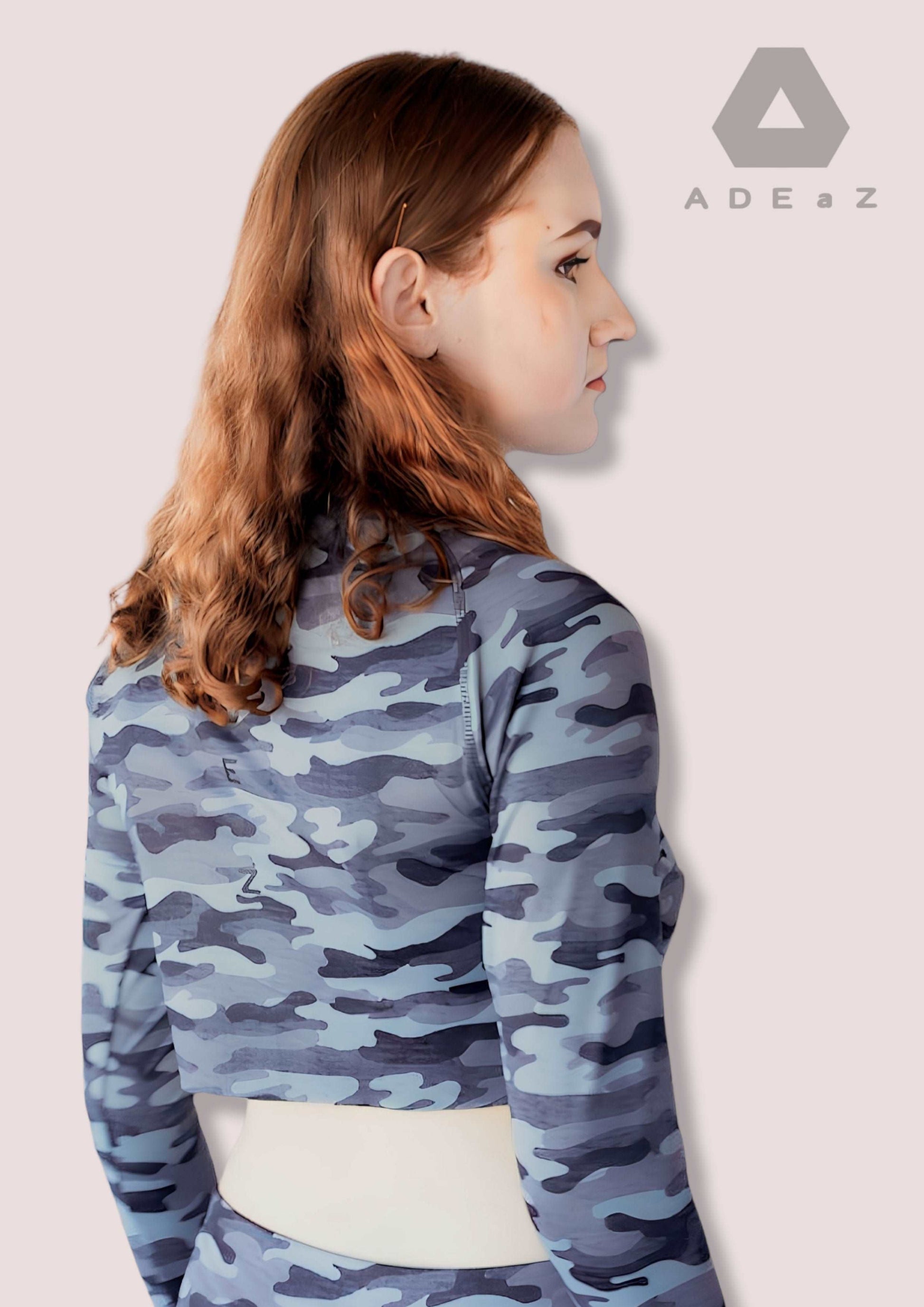 Camo Crop Top with Thumbhole: Camouflage patterned sleeveless crop top with built-in thumbholes for added style and comfort.