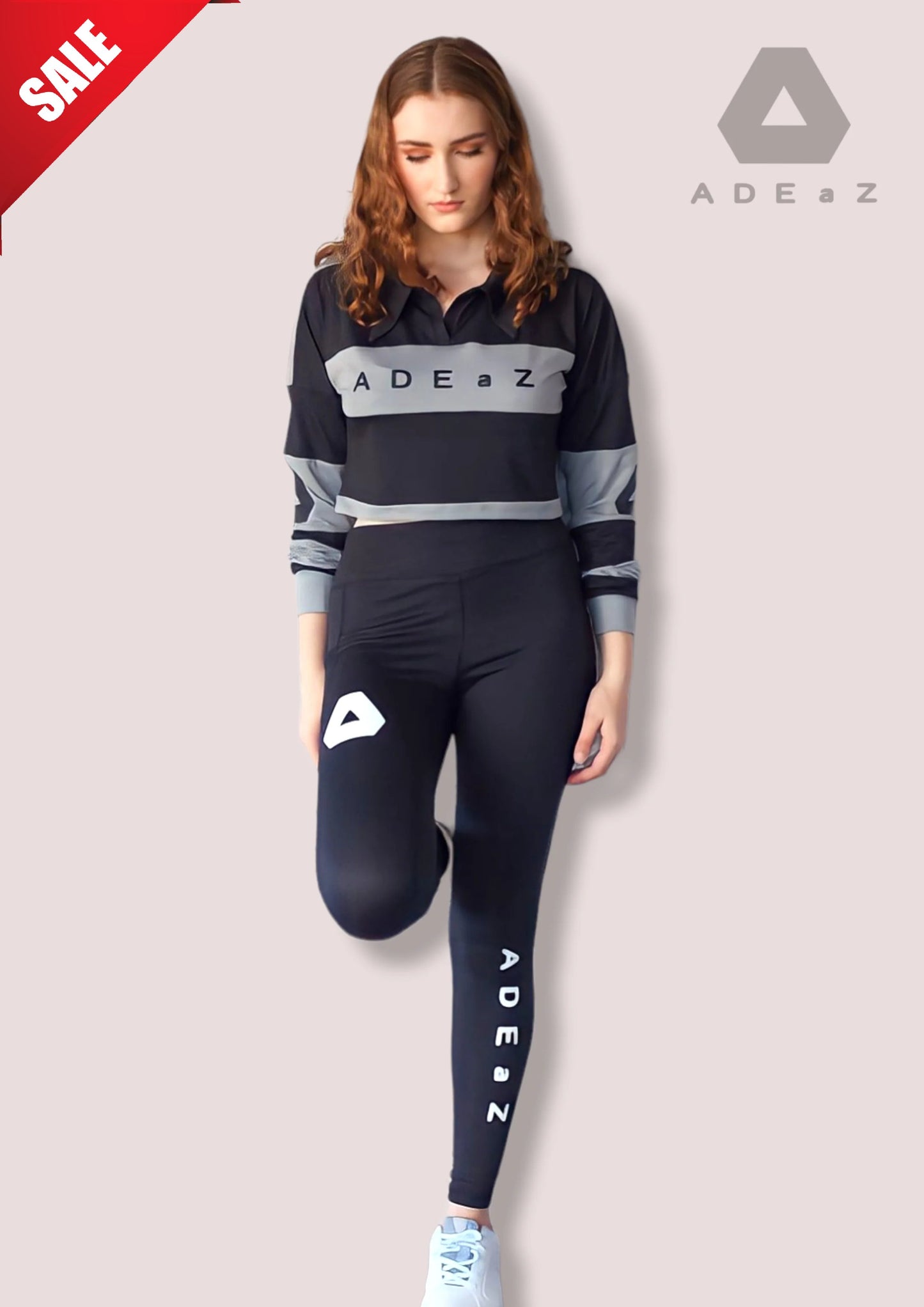 Women's long-sleeve collar crop top in soft colors, offering a stylish blend of sophistication and trendy design.