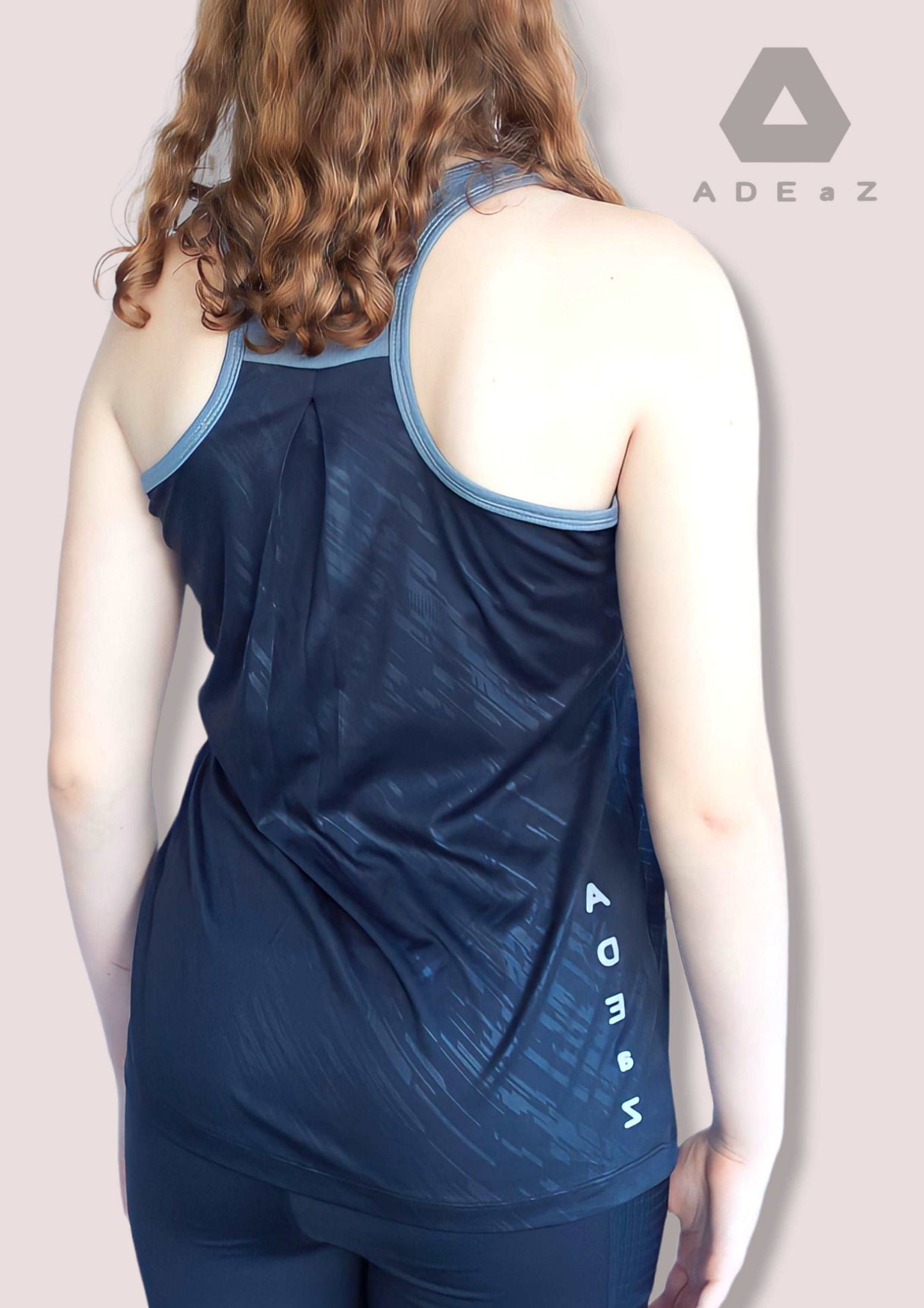 Women's racerback tank top , offering a comfortable fit and sporty style for various occasions.