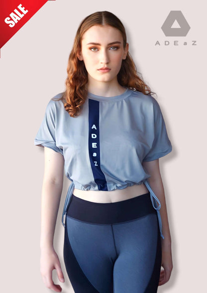 Short sleeve crop top with tie-up detail, offering a trendy and versatile style