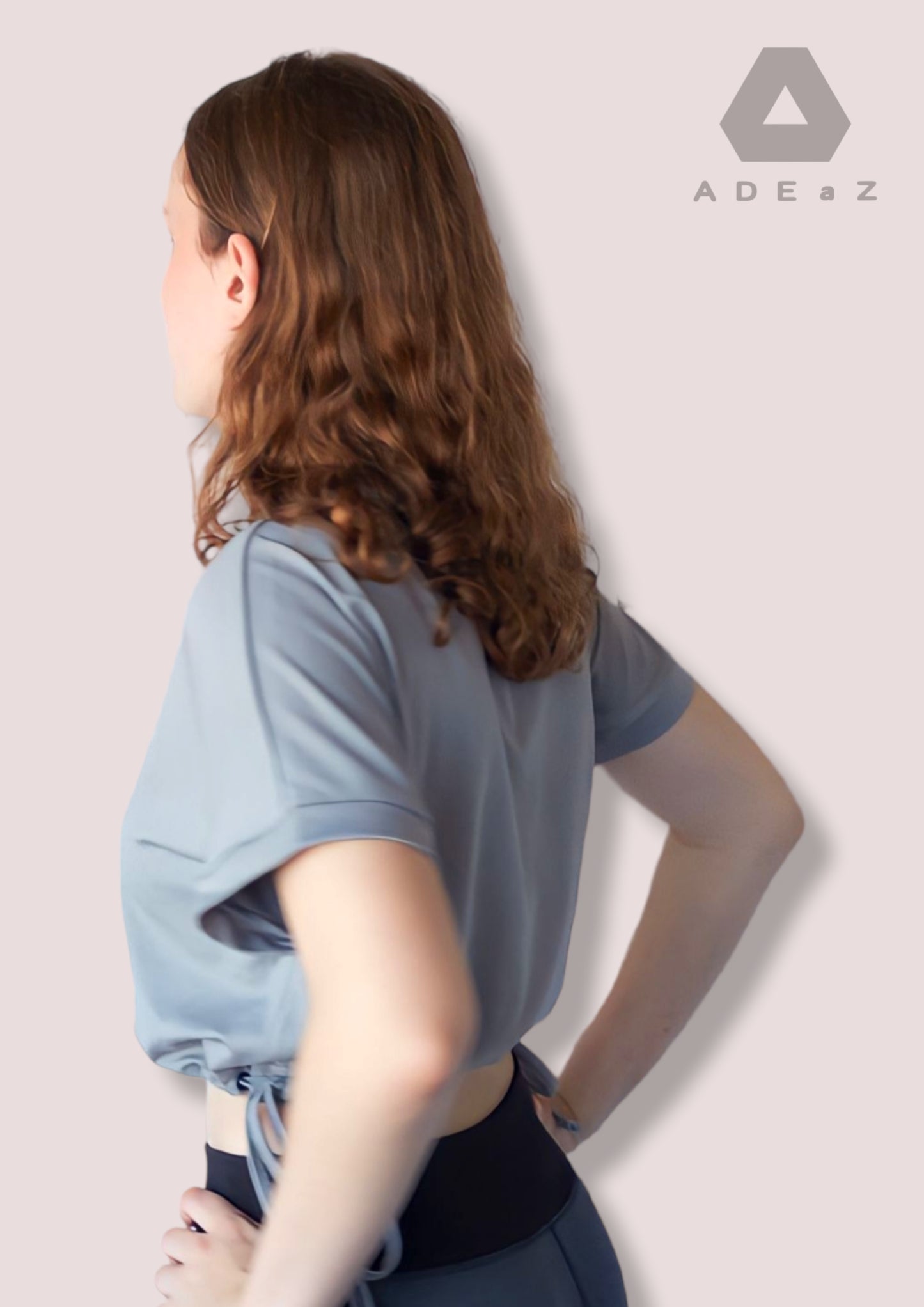 Short sleeve crop top with tie-up detail, offering a trendy and versatile style