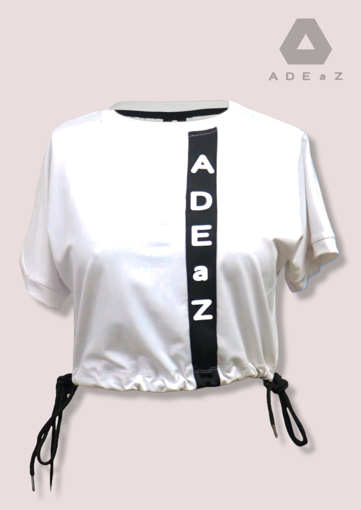 Short sleeve crop top with tie-up detail, offering a trendy and versatile style