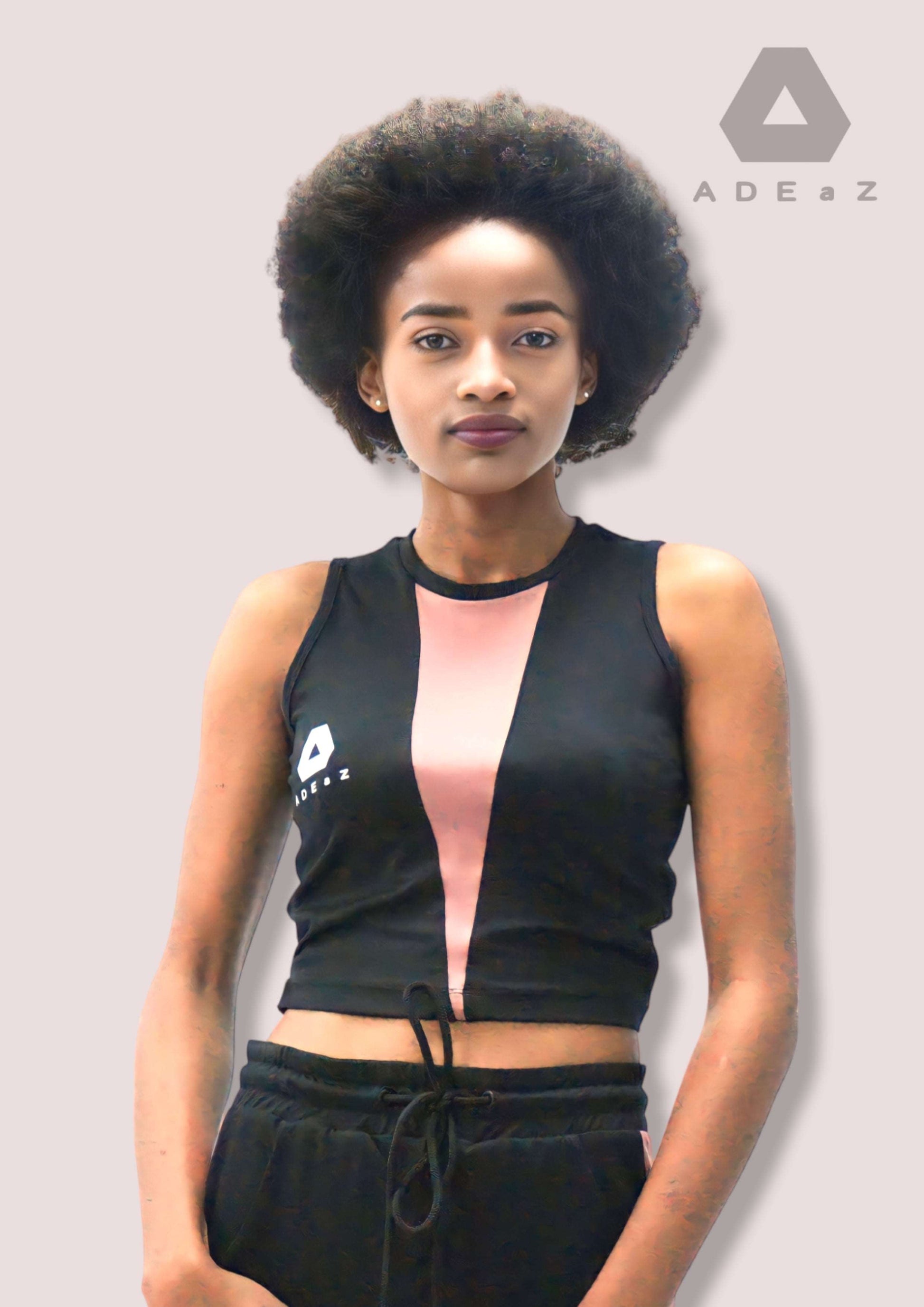 Sequined jewel crop top in vibrant shades of pink and black, adding sparkle and glamour to any outfit.