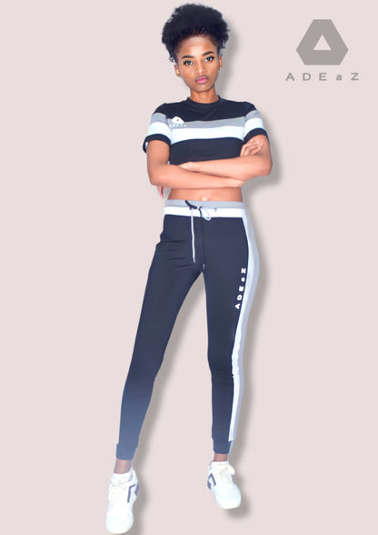 Tapered jogger tights in black, white and charcoal gray, designed for a snug fit and comfortable athletic wear