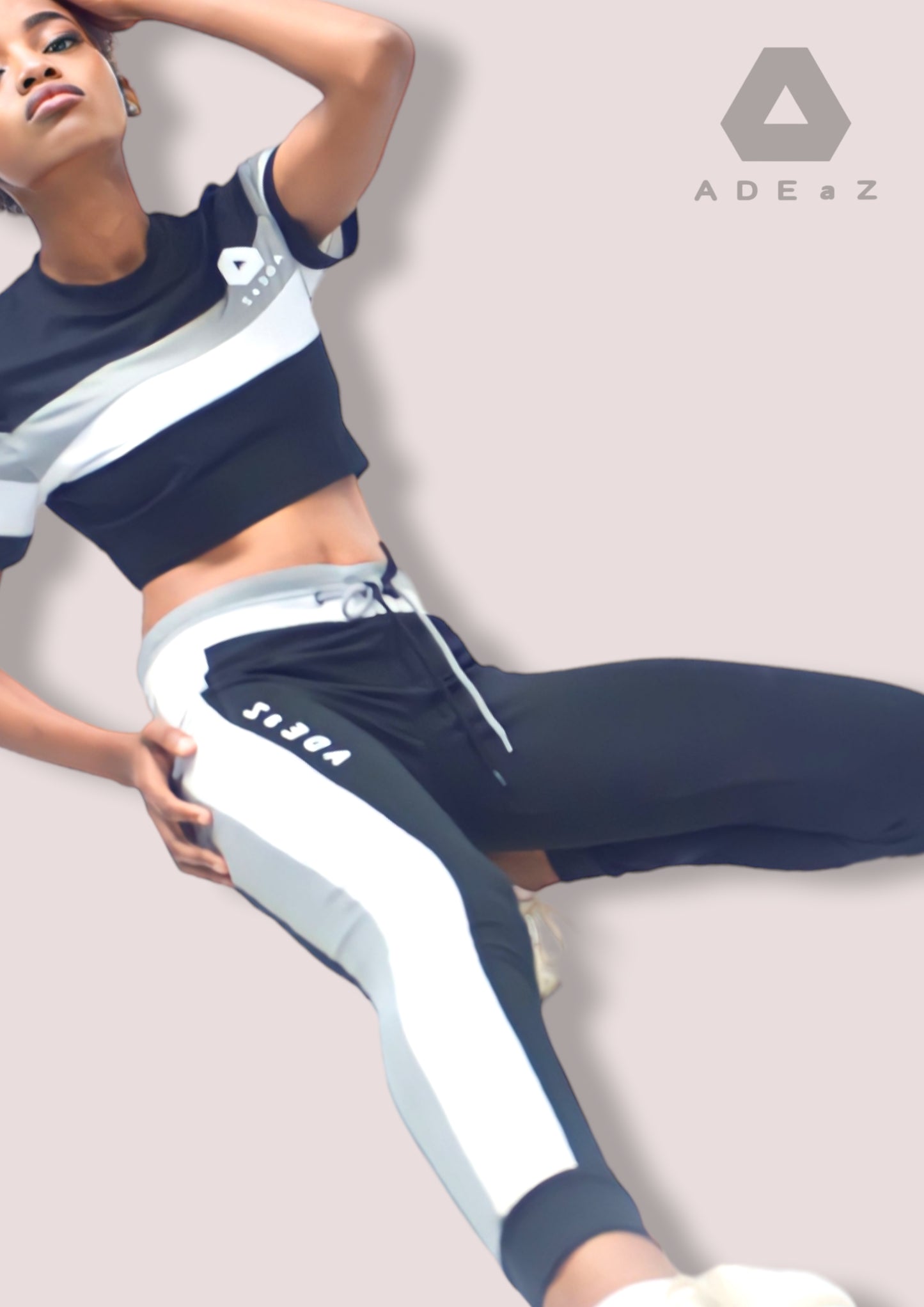 Tapered jogger tights in black, white and charcoal gray, designed for a snug fit and comfortable athletic wear