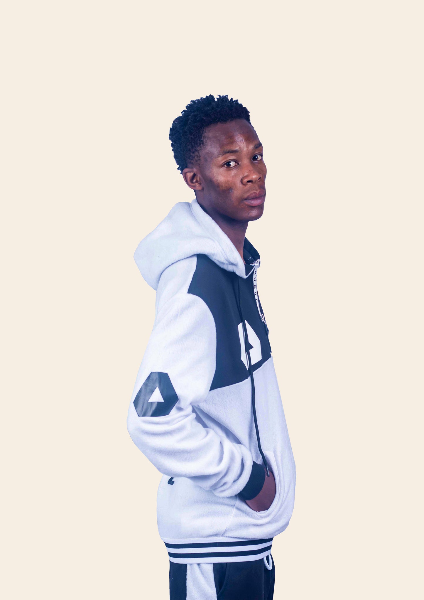 Omali Themba wearing Man's sporty hoodie